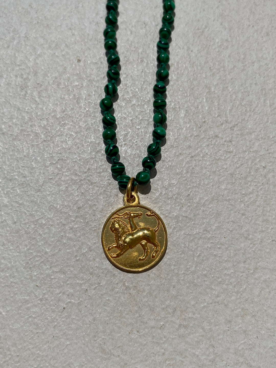 Chimera Amulet on Green Onyx Beads